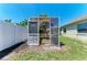 Open greenhouse on a sunny day, ideal for gardening enthusiasts at 7420 Tuttle Ave, Sarasota, FL 34243