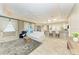 Bright and airy living room featuring neutral tones, an open floor plan, and lots of natural light at 7420 Tuttle Ave, Sarasota, FL 34243