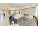 Comfortable living room with an open floor plan, tile flooring, and a neutral color palette at 7420 Tuttle Ave, Sarasota, FL 34243