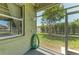 Outdoor shower on the patio provides a convenient rinsing spot after enjoying the outdoors or pool at 7420 Tuttle Ave, Sarasota, FL 34243