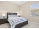 Comfortable bedroom with a cozy bed, matching nightstands, and ample natural light from the window at 7582 Camden Harbour Dr, Bradenton, FL 34212