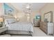 Serene main bedroom features neutral tones, ample closet space, and access to the en-suite bathroom at 7582 Camden Harbour Dr, Bradenton, FL 34212