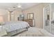 Spacious main bedroom features neutral tones, ample closet space, and serene decor at 7582 Camden Harbour Dr, Bradenton, FL 34212