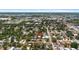 Aerial view of a residential area showcasing a home with a landscaped backyard at 815 Hand Ave, Sarasota, FL 34232