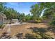 Expansive backyard featuring a patio area perfect for outdoor gatherings and relaxation at 815 Hand Ave, Sarasota, FL 34232