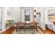 Well-lit dining area featuring hardwood floors and stylish decor at 815 Hand Ave, Sarasota, FL 34232