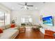 Comfortable living area with hardwood floors and a cozy seating arrangement at 815 Hand Ave, Sarasota, FL 34232