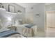 Comfortable bedroom features twin beds, neat decor, and a peaceful ambiance for restful nights at 9470 High Gate Dr # 2213, Sarasota, FL 34238