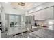Bright kitchen showing granite countertops, stainless steel fridge, and outdoor patio access at 9470 High Gate Dr # 2213, Sarasota, FL 34238