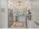 Bright kitchen featuring granite countertops, stainless steel appliances, and tiled floors at 9470 High Gate Dr # 2213, Sarasota, FL 34238