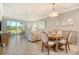 Inviting living room and dining area with lots of natural light and neutral tones at 9470 High Gate Dr # 2213, Sarasota, FL 34238