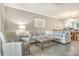 Well-lit living area with neutral decor, perfect for relaxation and entertainment at 9470 High Gate Dr # 2213, Sarasota, FL 34238