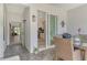 Covered patio with an outdoor seating area and access to the interior and exterior at 9470 High Gate Dr # 2213, Sarasota, FL 34238
