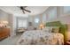 Bright bedroom with decorative seating and matching furnishings at 975 Whitakers Ln, Sarasota, FL 34236