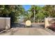 Elegant gated entrance to Whitaker's Landing community with lush landscaping and a private road at 975 Whitakers Ln, Sarasota, FL 34236