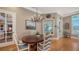 Cozy dining area with a chandelier and view of the water at 975 Whitakers Ln, Sarasota, FL 34236