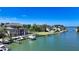 Waterfront property with a boat dock offering scenic views of boats and waterfront community at 975 Whitakers Ln, Sarasota, FL 34236