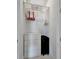 A well-organized closet features shelving, a dresser, and space for luggage at 10394 Abaco Falls Dr, Englewood, FL 34223