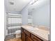 Clean bathroom with walk-in shower, neutral color scheme, and functional vanity at 1122 42Nd E Ter, Bradenton, FL 34208