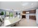 A desirable open floorplan seamlessly integrates the kitchen, dining, and living areas for social gatherings and comfortable living at 1122 42Nd E Ter, Bradenton, FL 34208