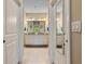 Bright bathroom with dual sinks, granite countertops, and ample cabinet space at 12409 Osorio Ct # 102, Sarasota, FL 34238