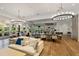 Relaxing clubhouse area with comfortable seating, dining tables, and an open layout for social gatherings and events at 12409 Osorio Ct # 102, Sarasota, FL 34238