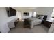 Bright and airy main bedroom featuring modern furniture, neutral colors, and soft carpet at 13016 Cedar Elm Lane, Parrish, FL 34219
