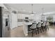 Beautiful kitchen featuring stainless steel appliances, granite countertops, and breakfast bar seating at 13587 Vancanza Dr, Venice, FL 34293
