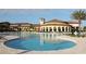 Resort-style pool area with a large pool and seating, ideal for community gatherings at 13587 Vancanza Dr, Venice, FL 34293