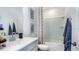 Cozy bathroom with a vanity sink, framed artwork, and a shower-tub combination at 15153 Cuzcorro Ct, Nokomis, FL 34275