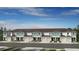 New construction townhomes with attached garages and neutral toned paint at 15169 Cuzcorro Ct, Nokomis, FL 34275