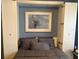 Comfortable Murphy bed with built in storage and stylish decor at 1620 San Silvestro Dr, Venice, FL 34285