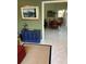 Inviting dining room with seating for six, hardwood floors, and stylish light fixture at 1620 San Silvestro Dr, Venice, FL 34285
