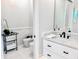Modern bathroom featuring a vanity with marble counters, and a sleek bidet and toilet at 1643 Stanford Ln, Sarasota, FL 34231
