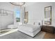 Bright bedroom with large windows, mirrors, and a comfortable bed at 1643 Stanford Ln, Sarasota, FL 34231