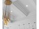 A modern ceiling and hanging light fixture design at 1643 Stanford Ln, Sarasota, FL 34231