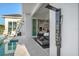 Poolside outdoor shower with modern fixtures at 1643 Stanford Ln, Sarasota, FL 34231