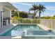 Backyard swimming pool and jacuzzi with patio at 1643 Stanford Ln, Sarasota, FL 34231