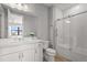 Bright bathroom featuring a shower, tub, and vanity with white cabinets and white countertops at 16434 Slate Pl, Bradenton, FL 34211