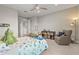 Bright bedroom with a bed, chair, and toy decorations at 16434 Slate Pl, Bradenton, FL 34211