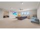 Large bonus room perfect for entertaining, with plenty of seating and natural light at 16434 Slate Pl, Bradenton, FL 34211