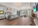 Expansive primary bedroom suite with hardwood floors, sitting area, and natural light at 16434 Slate Pl, Bradenton, FL 34211