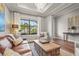 Cozy sitting room with plush seating, natural light, and stylish decor at 16434 Slate Pl, Bradenton, FL 34211