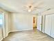 Neutral bedroom with natural light features two closets and easy access to the bathroom at 1708 Tarpon Ave, Sarasota, FL 34234