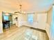 Bright dining area with view to the kitchen and breakfast nook at 1708 Tarpon Ave, Sarasota, FL 34234