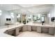 Elegant bathroom with multiple sinks, mirrors, and modern fixtures creates a luxurious space at 17510 Gawthrop Dr # 208, Bradenton, FL 34211