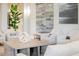 Cozy living area with comfortable seating, chic decor, and ample natural light, great for entertaining at 17510 Gawthrop Dr # 208, Bradenton, FL 34211