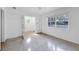 Clean bedroom with bright natural light and Terrazzo floors at 1773 South Dr, Sarasota, FL 34239
