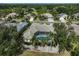Aerial of the house featuring a screened-in pool, perfect for outdoor relaxation and entertaining at 2111 Muskogee Trl, Nokomis, FL 34275
