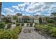 Beautiful single-story home with well-maintained landscaping at 2111 Muskogee Trl, Nokomis, FL 34275